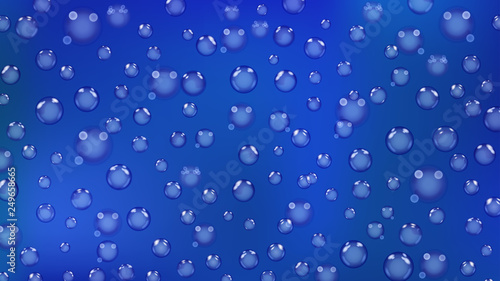 Background of bubbles or water drops of different sizes in blue colors