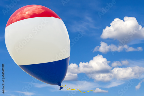 Balloon with the image of the national flag of France, flying through the blue sky. 3D rendering, illustration with copy space. photo