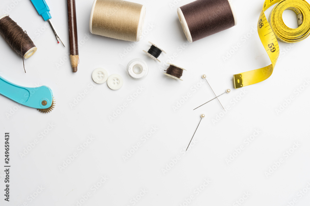 Fototapeta premium sewing supplies and accessories for needlework fabric spools