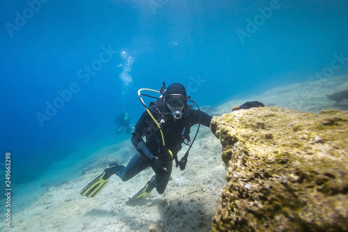 Scuba diver posing underwater