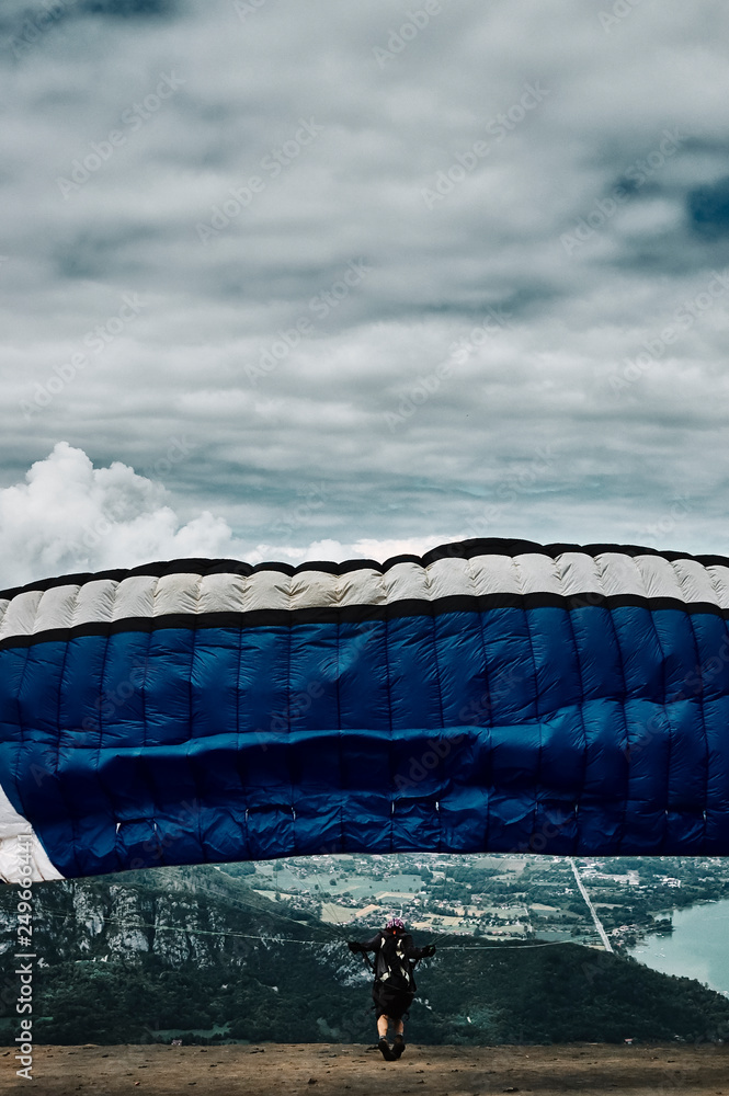 Obraz premium Paragliding over the hills of Annecy, France