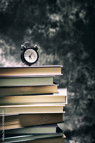 Clock on books