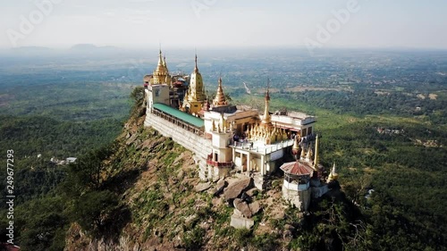 Aerial: Close Look Over the Top of Popa Taungkalat Temple photo