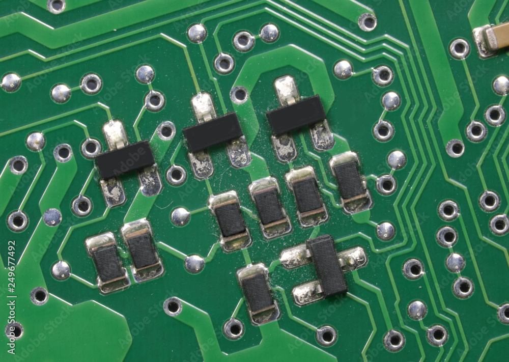 transistors and diodes of an electronic board photographed with transistors and diodes of an electronic board photographed with