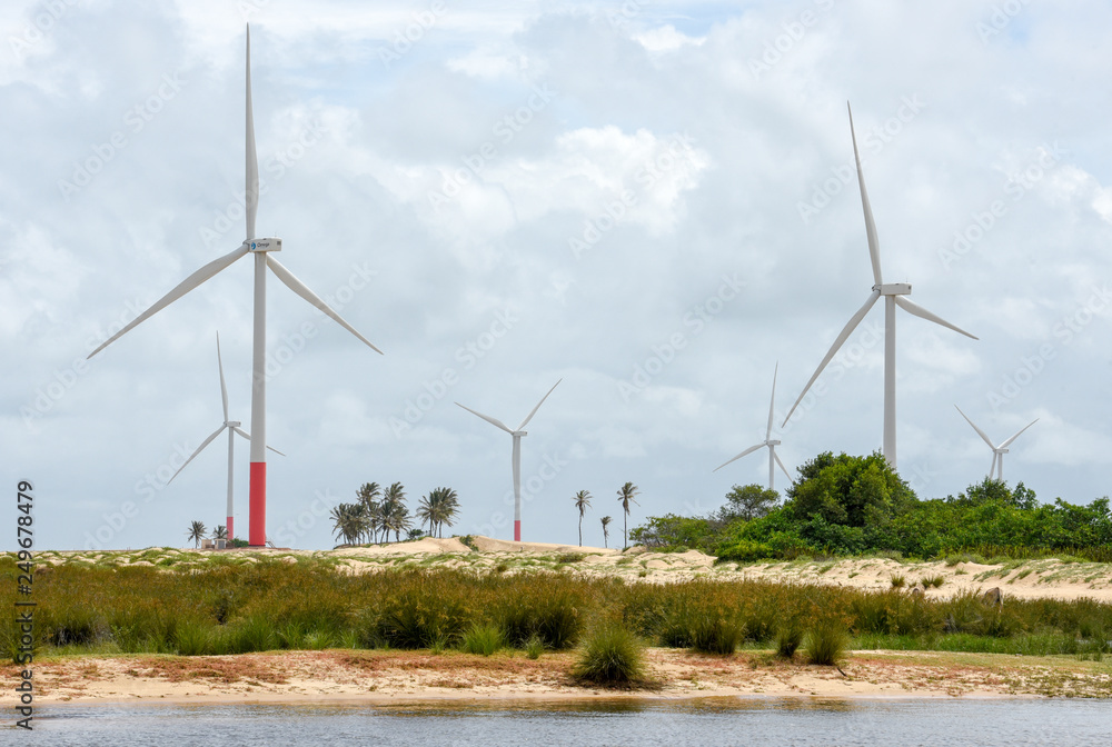 Windmills on the sand dunes of Lencois Maranhenses near Atins, Brazil