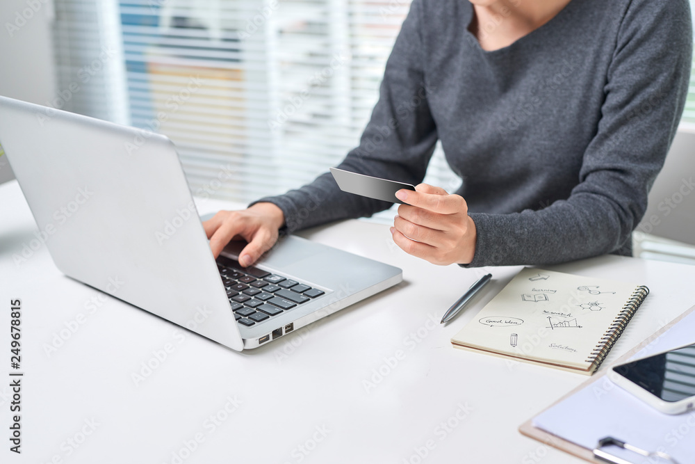 A beautiful lady sitting at a table. Office life. Work place. A beautiful lady sitting at a table. Office life. Work place.