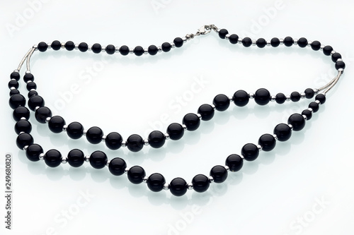 Necklaces, beads, handmade bracelets are made of artificial stone of different breeds.