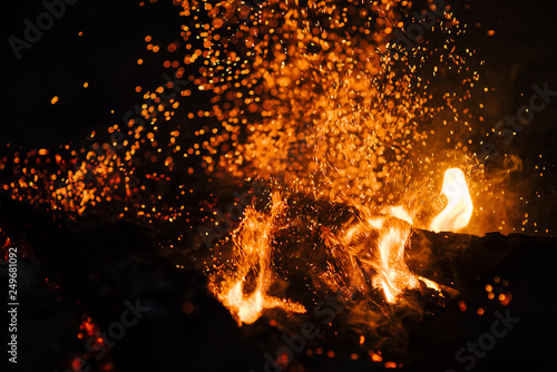 Hot flame heat fire abstract black background. concept: burn, flame, heat, lighting ,blaze ,glow, flash