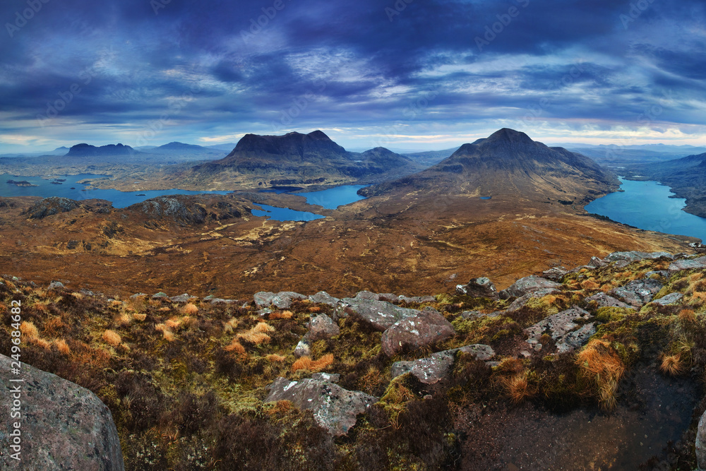 The inverpolly nature reserve in northern Scotland. Autumn panorama, Highlands. Loch Lurgainn and Stac Pollaidh mountain in the far northwest of Scotland. UK Beautiful landscape background concept
