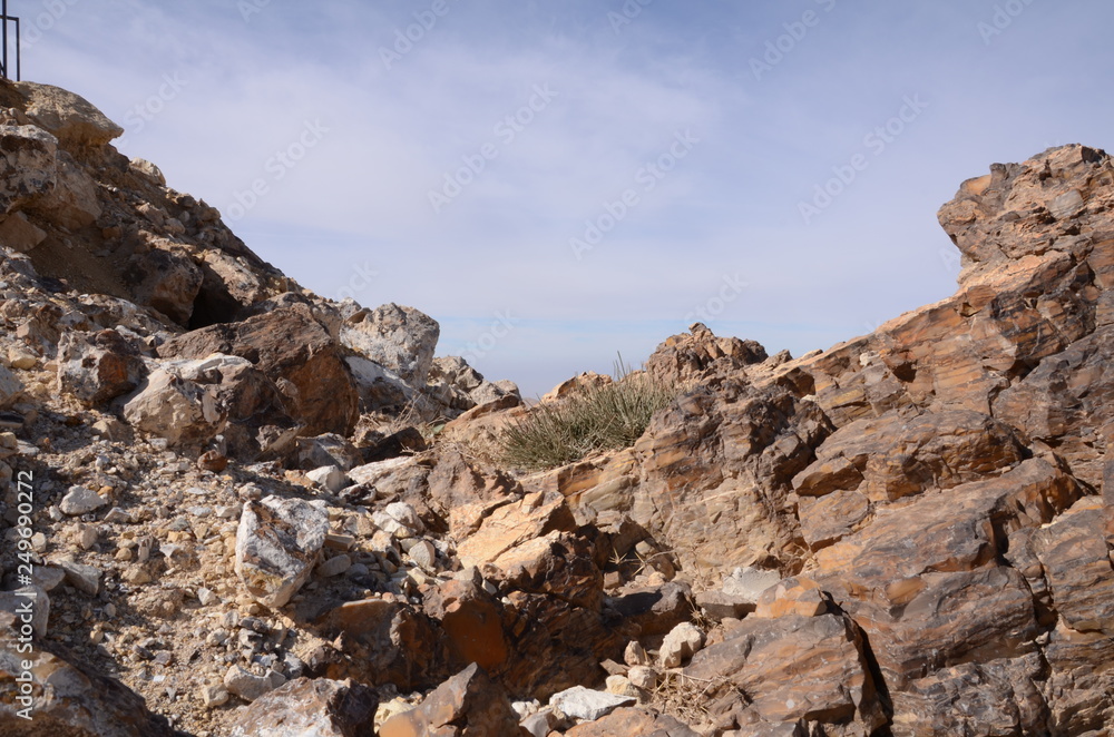 volcanic landscape with rocks and blue sky volcanic landscape with rocks and blue sky