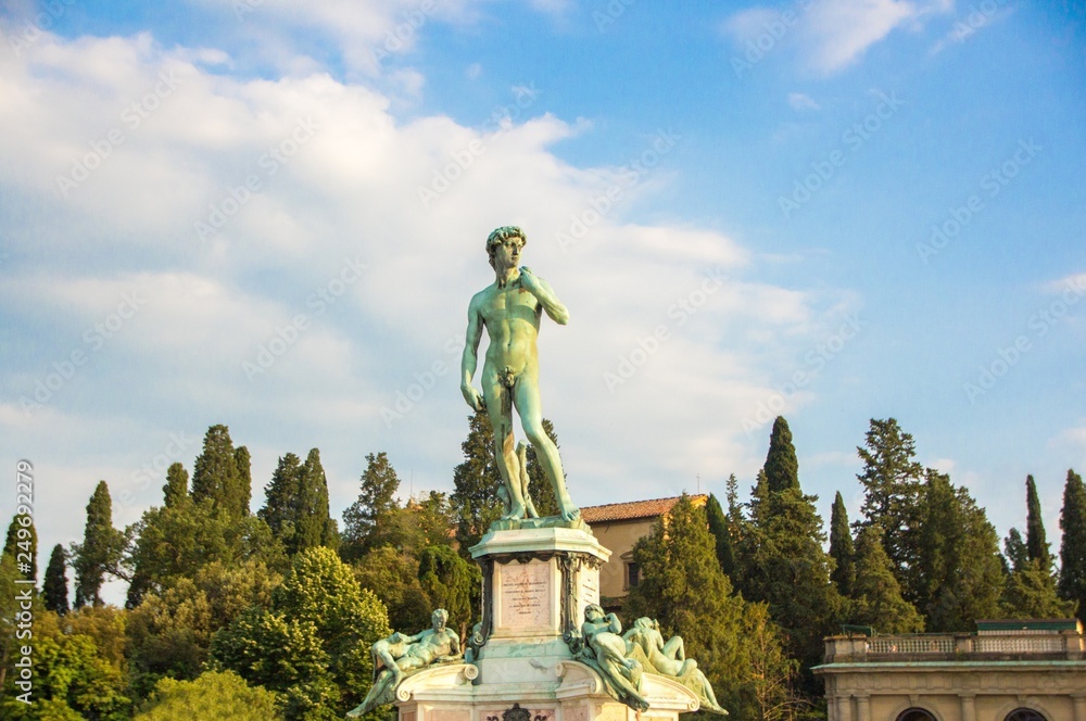 David Statue at Michelangelo square. Summer sunny evening. Florence, Italy. David Statue at Michelangelo square. Summer sunny evening. Florence, Italy.