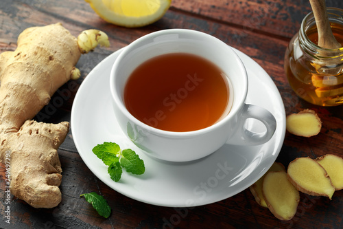 Ginger Tea with mint, lemon and honey. warm healthy winter drinks