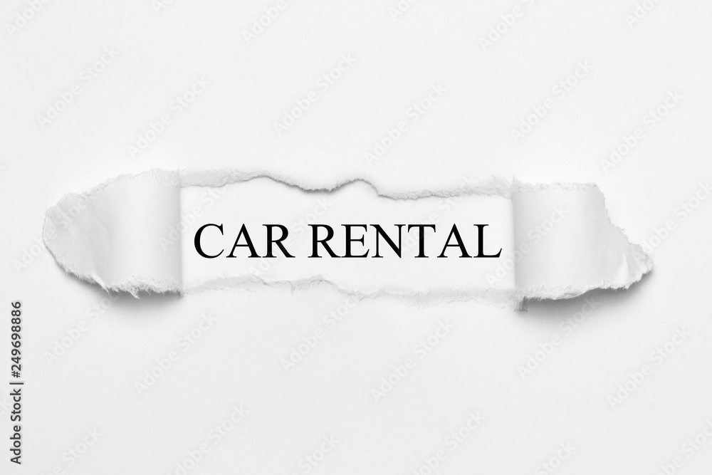 Car Rental on white torn paper Car Rental on white torn paper
