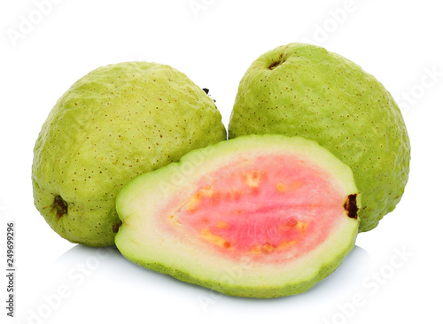 two whole and half pink guava isolated on white background