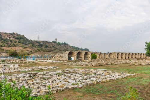 Historical site of Perge or Perga in Antalya, Turkey. Vast remains of prosperous Roman city. Ancient Perge city existed from X century before Christ till VIII of our era.  photo