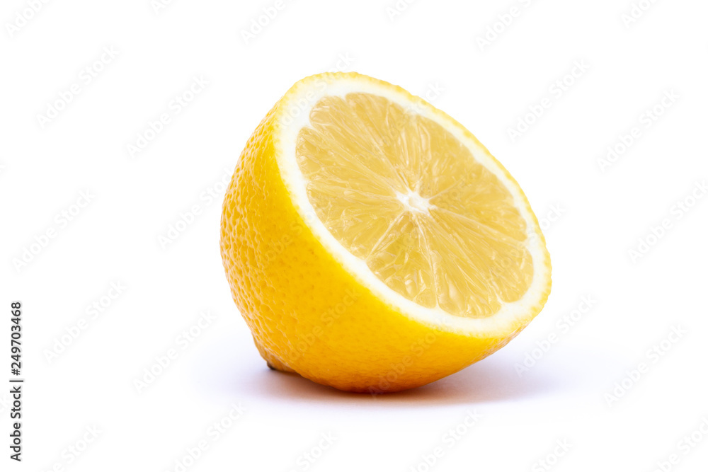 Isolated half of juicy yellow lemon on white background