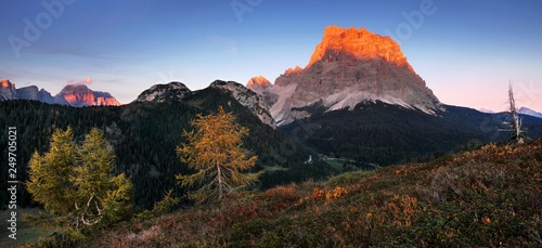 Gorgeous sunny view of Dolomite Alps with yellow larch trees. Colorful autumn scene of Pelmo mountain range. Giau pass location, Italy, Europe. Beauty of nature concept background. Cortina d ampezzo © Michal