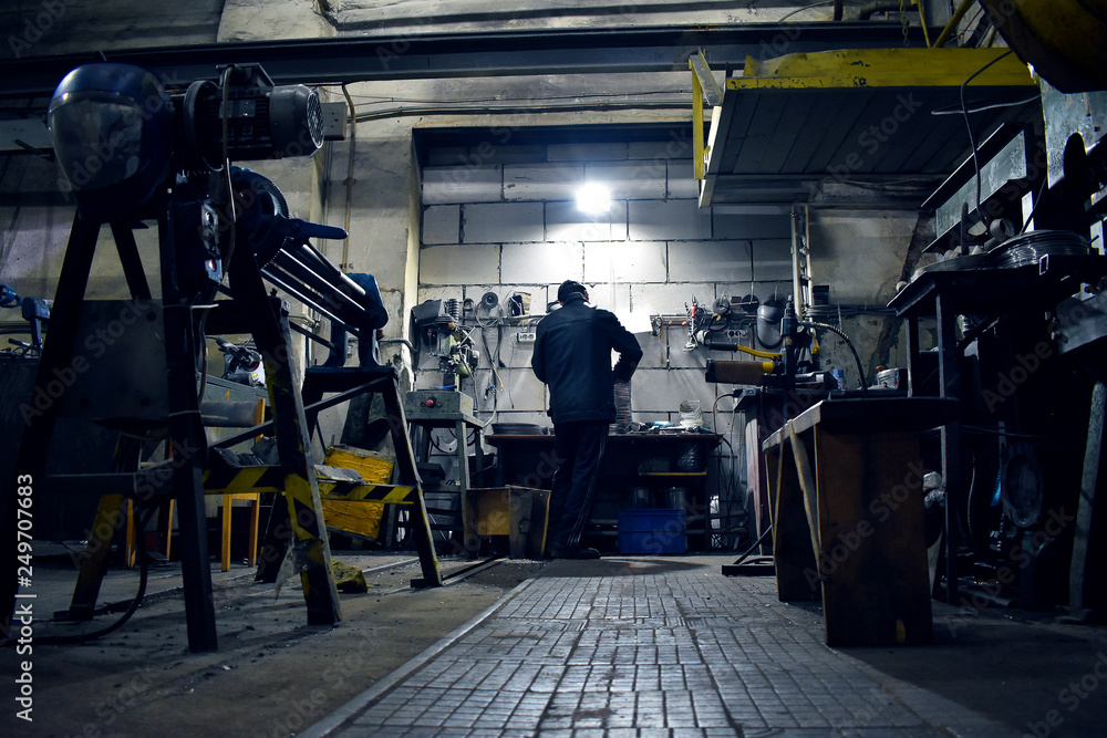 Fototapeta premium workshop with a man in the background