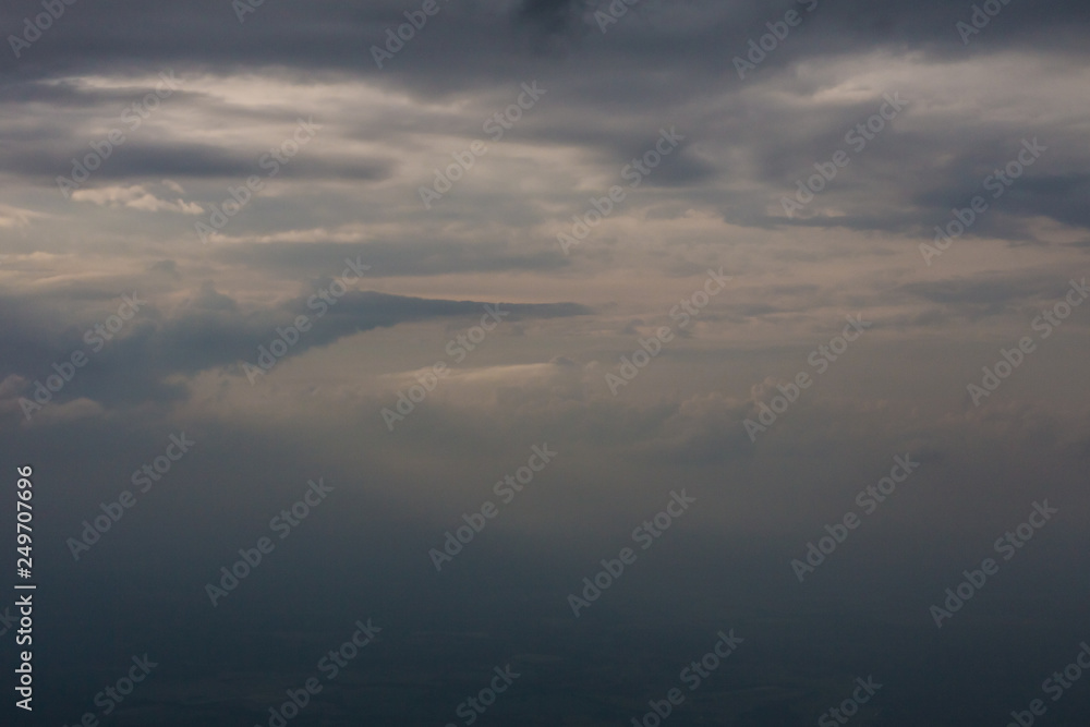 White clouds and blue sky from an airplane