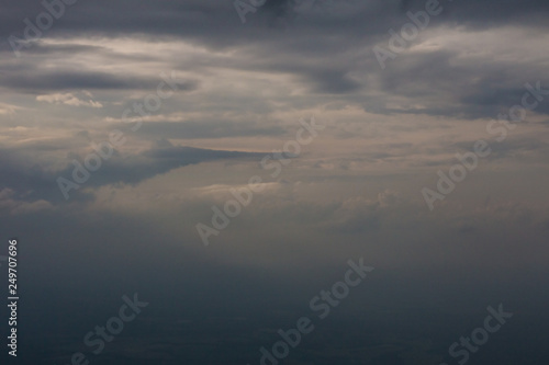 White clouds and blue sky from an airplane © NCKAHDEP