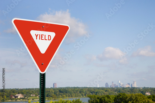 Yield Sign With City Skyline