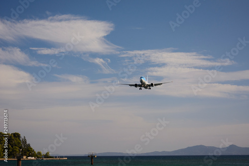 the plane flies over the sea 