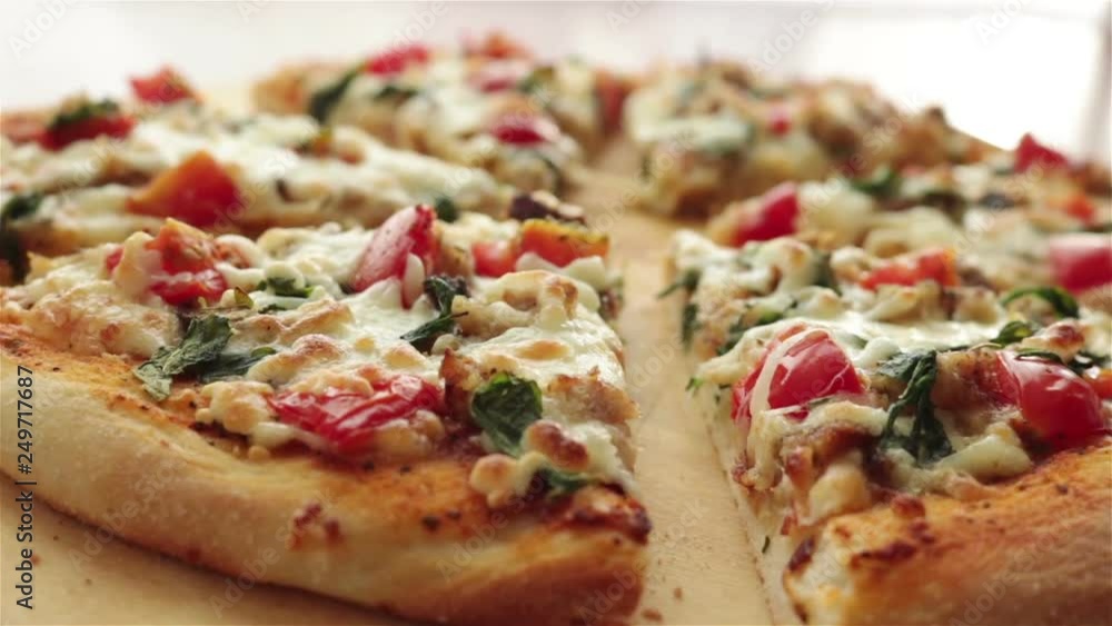 tasty pizza slices on wooden board panning shot depth of field tasty pizza slices on wooden board panning shot depth of field