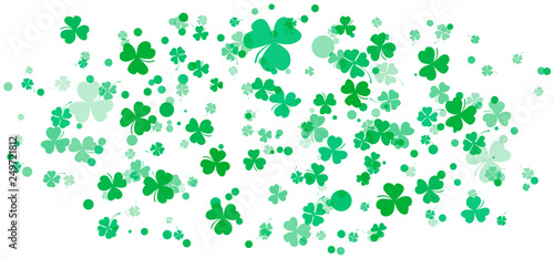 St. Patricks day background with shamrock. Lucky trefoil confetti.  Shining clover shamrock leaves on white background. Template for poster  gift certificate  greeting cards design  banner