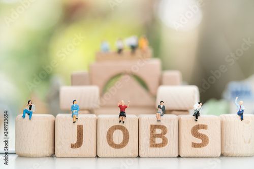 фотографія Wood block word JOB and business man with copy space using as background Choice of the best suited employee, HR, HRM, HRD, job recruiter concepts
