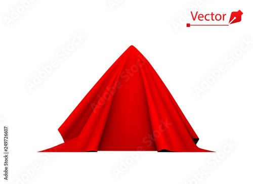 Object covered with red silk cloth. Pyramid, hidden under satin fabric.