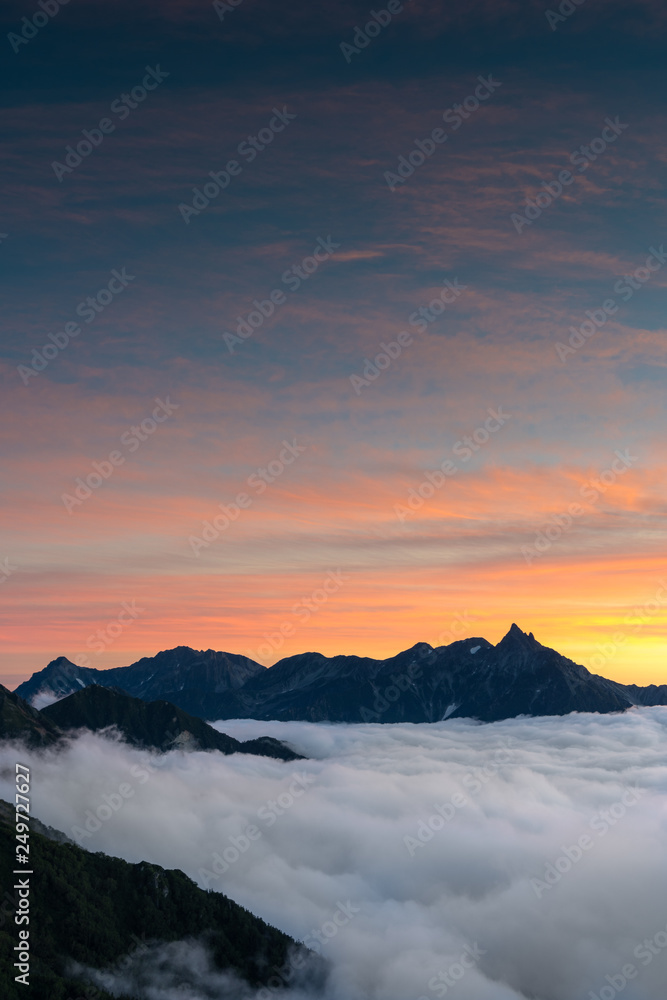 Sunset at Mt Tsubakuro in the Japan alps with clouds