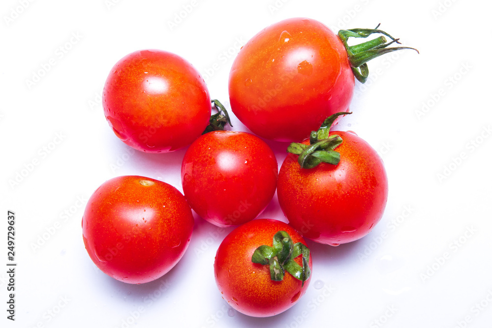 Red tomatoes isolated on white background. Red tomatoes isolated on white background.