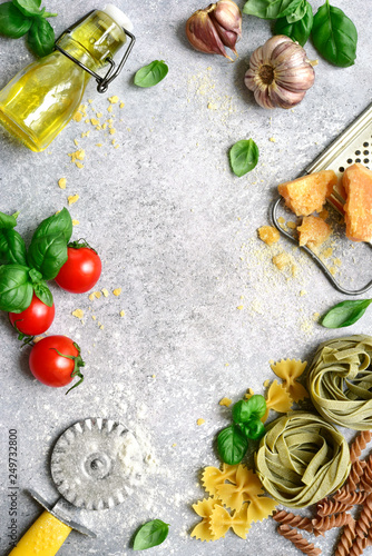 Ingredients and props for cooking of traditional italian dish.Top view with copy space.