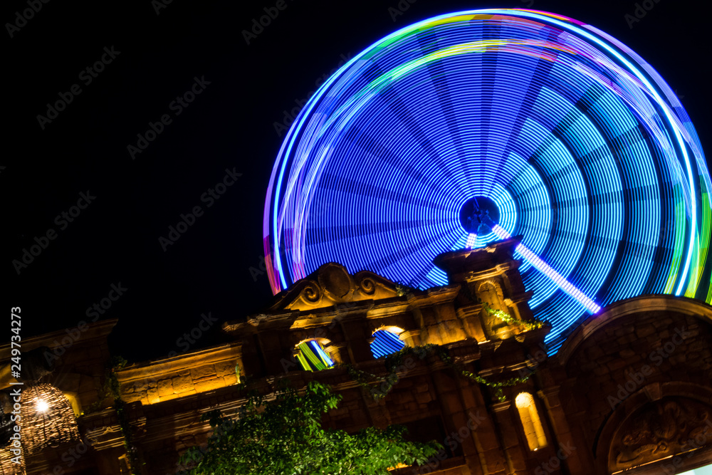 long exposure of ferris wheel at night