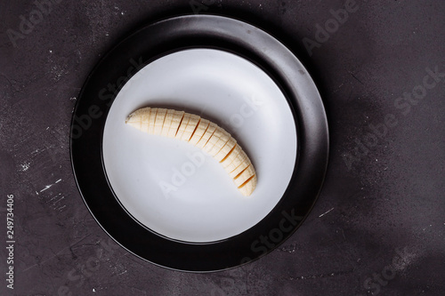 Close up a sliced banana on a table. Healthy food, diet, Breakfast concept