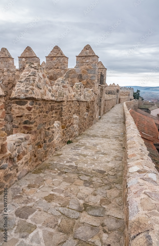 The magnificent medieval walls of Avila, Castile-Leon, Spain. A UNESCO World Heritage Site completed between the 11th and 14th centuries The magnificent medieval walls of Avila, Castile-Leon, Spain. A UNESCO World Heritage Site completed between the 11th and 14th centuries