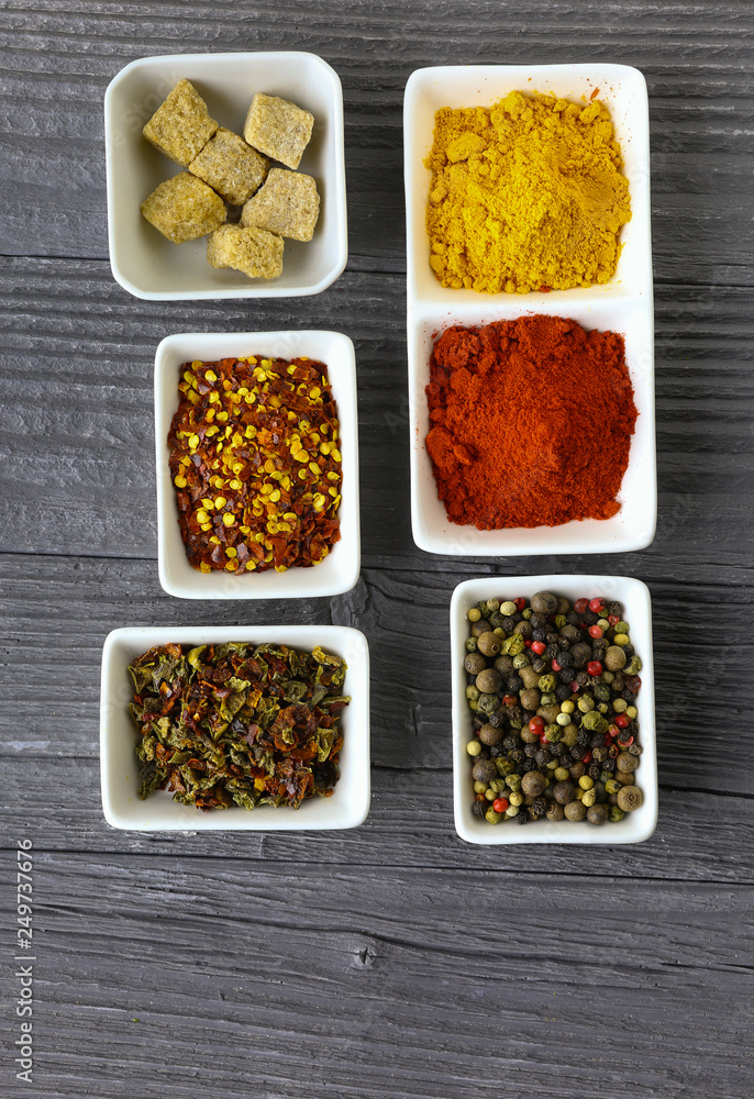 Set of Various spices on black stone table. Top view Set of Various spices on black stone table. Top view