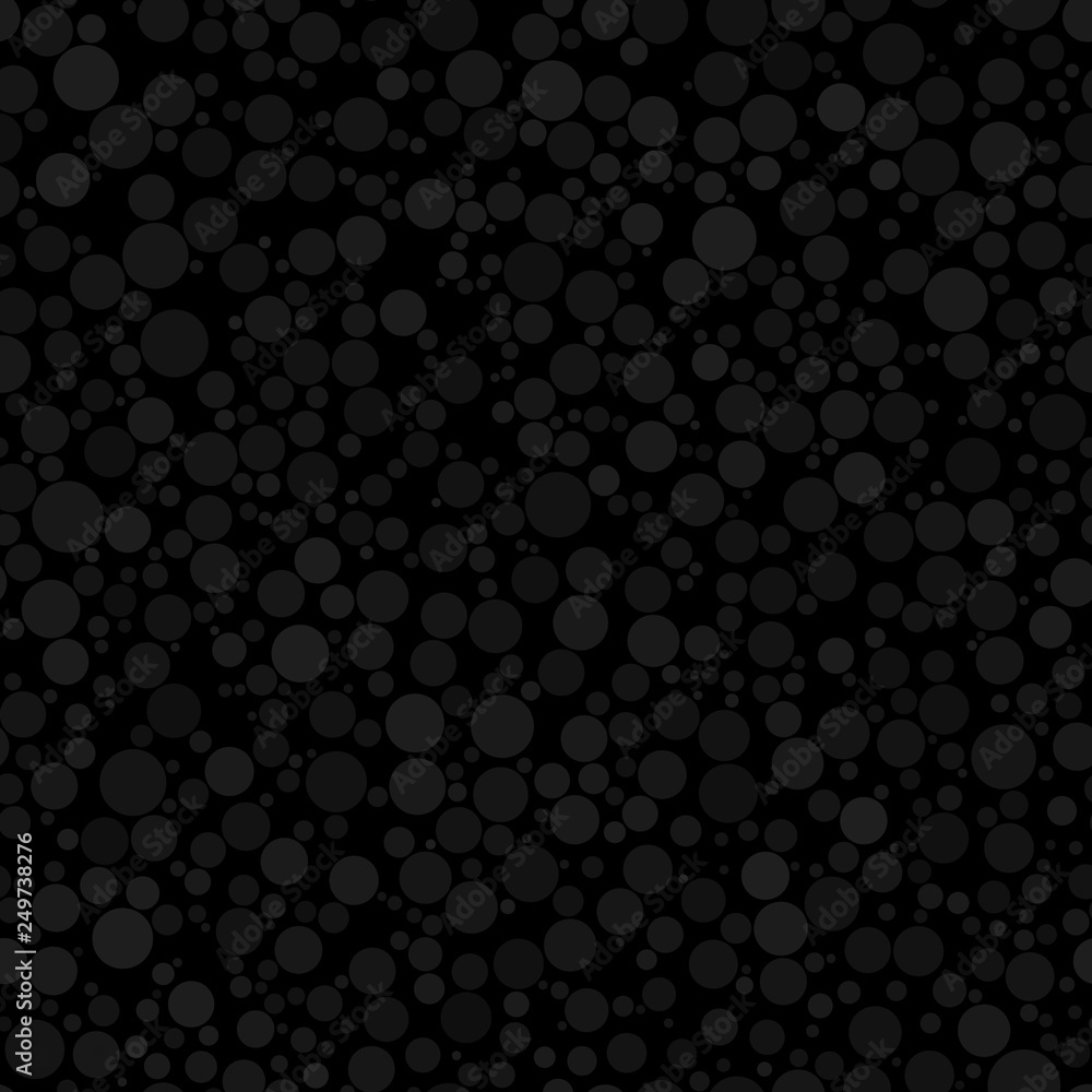 Abstract seamless pattern of circles of different sizes in black and gray colors