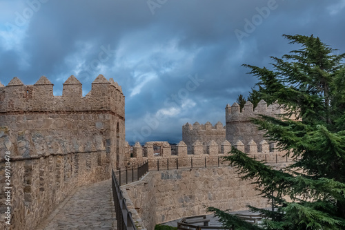 The magnificent medieval walls of Avila, Castile-Leon, Spain. A UNESCO World Heritage Site completed between the 11th and 14th centuries photo