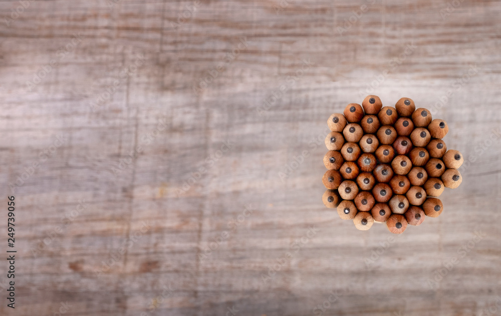 pencils seen from above forming a circle with wooden background vintage pencils seen from above forming a circle with wooden background vintage
