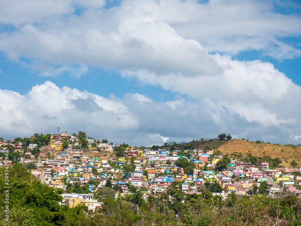 Small colored village on a hill. the southern town of Yauco sizzles with naturally saturated colors
