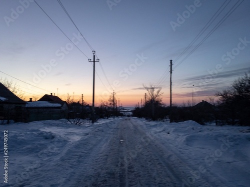 sunset on the road in winter