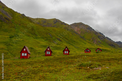 The Hatcher Pass Lodge is a collection of 11 tiny red cabins situated 3000 feet above the tree line in Alaska's Talkeetna, United States of America, North America, tourism in the mountains, isolated