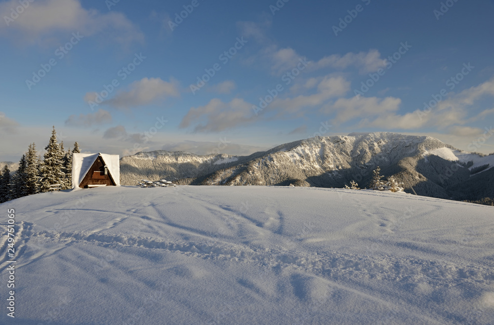 JASNA, SLOVAKIA - It is the largest ski resort in Slovakia with 49 km of pistes in Jasna, Slovakia. Snow, sunny winter day, closed restaurant