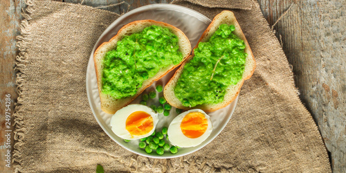 green peas, avocado and vegetable pate - sandwich (healthy food). food concept. top view