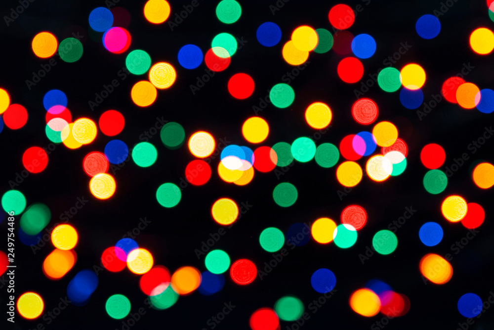Naklejka premium Bokeh Lights On a Black Background
