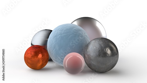 3D illustration of a set of spheres of different diameter, different material. Metal, gold, silver and other jewelry on a white surface, isolated. Abstraction. 3D rendering.