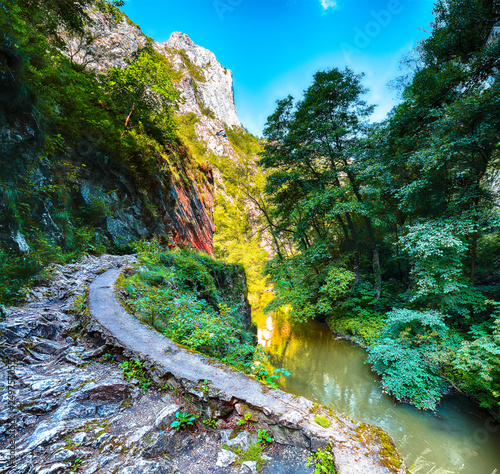 Turda gorge Cheile Turzii is a natural reserve with marked trails for hikes on Hasdate River photo