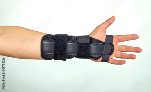 Man hand with adjustable immobilizer.