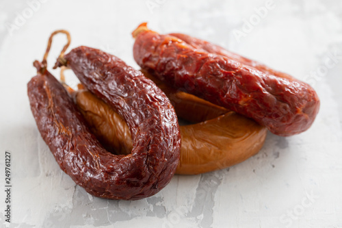 portuguese smoked sausages on ceramic background
